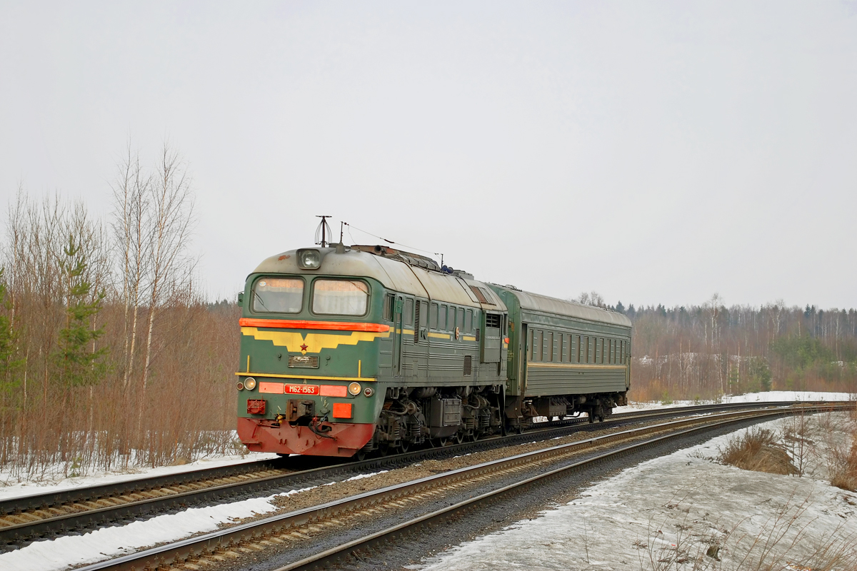 Фотоэнциклопедия железнодорожного транспорта. | Главная / Поиск / М62-1563  с пригородным поездом Светогорск - Выборг